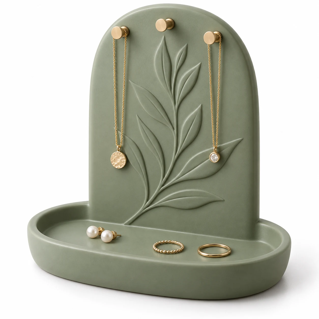 KELIKULI Botanical Ridge sculptural resin jewelry organizer with three gold-tone pegs and integrated vanity tray, styled with necklaces, pearl earrings and rings on a white background.